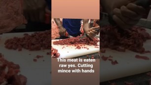 'Eating Raw meat in Johannesburg at one Ethiopian restaurant Rand In.'