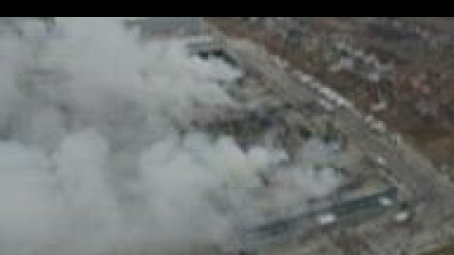 'Clouds of smoke rising from destroyed food depot'