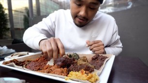 'Asian Guy First Time Eating Ethiopian Food'