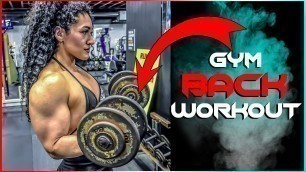 'Woman Back Workout At Gym 